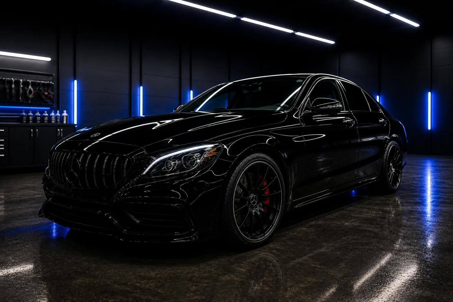 Black Mercedes sedan in The Auto Edit-style detailing studio